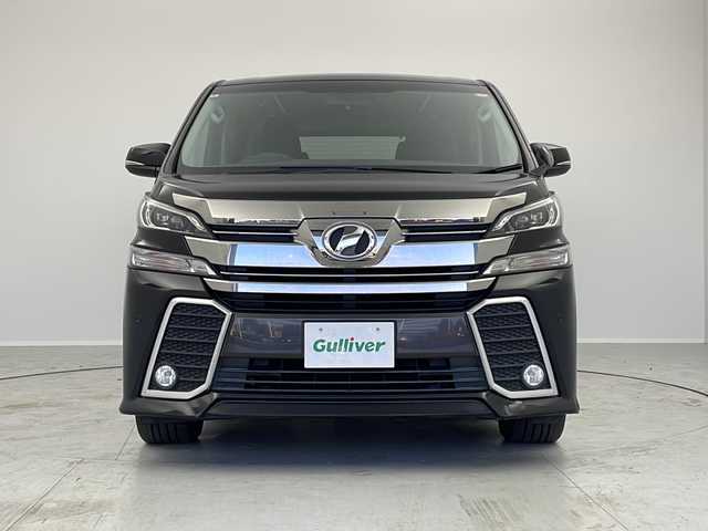 トヨタ ヴェルファイア Z 茨城県 2016(平28)年 6.1万km ブラック ９インチナビ　フルセグＴＶ　両側電動スライドドア　後席モニター　オットマン　ＥＴＣ　１００Ｖ充電　パーキングアシスト　横滑り防止装置　衝突被害軽減ブレーキ　純正１８インチアルミホイール　ＬＥＤライト