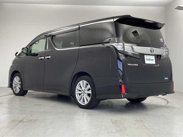 トヨタ ヴェルファイア Z 茨城県 2016(平28)年 6.1万km ブラック ９インチナビ　フルセグＴＶ　両側電動スライドドア　後席モニター　オットマン　ＥＴＣ　１００Ｖ充電　パーキングアシスト　横滑り防止装置　衝突被害軽減ブレーキ　純正１８インチアルミホイール　ＬＥＤライト