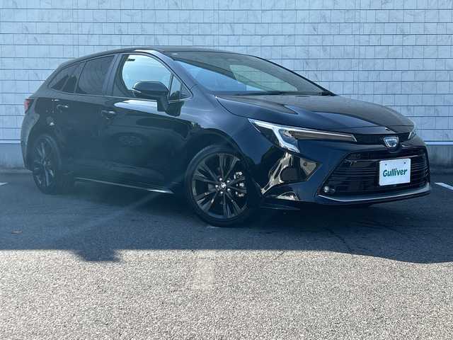 トヨタ カローラツーリング ハイブリッド ダブルバイビー 大阪府 2023(令5)年 1.1万km アティチュードブラックマイカ ワンオーナー/ブラインドスポットモニター/純正10.5型ナビ(BT/USB/フルセグ)/バックカメラ/衝突被害軽減システム/レーンキープアシスト/コーナーセンサー/アダクティブクルーズコントロール/オートライト/オートマチックハイビーム/純正アルミホイール/社外フロアマット/ハーフレザー/ビルトインETC/スマートキー/LEDヘッドライト