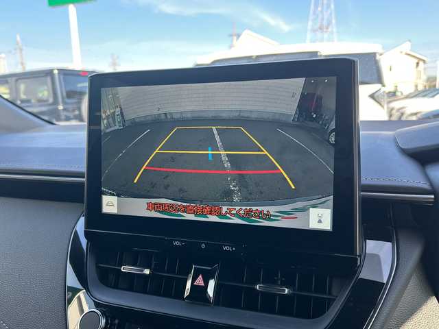 トヨタ カローラツーリング ハイブリッド ダブルバイビー 大阪府 2023(令5)年 1.1万km アティチュードブラックマイカ ワンオーナー/ブラインドスポットモニター/純正10.5型ナビ(BT/USB/フルセグ)/バックカメラ/衝突被害軽減システム/レーンキープアシスト/コーナーセンサー/アダクティブクルーズコントロール/オートライト/オートマチックハイビーム/純正アルミホイール/社外フロアマット/ハーフレザー/ビルトインETC/スマートキー/LEDヘッドライト