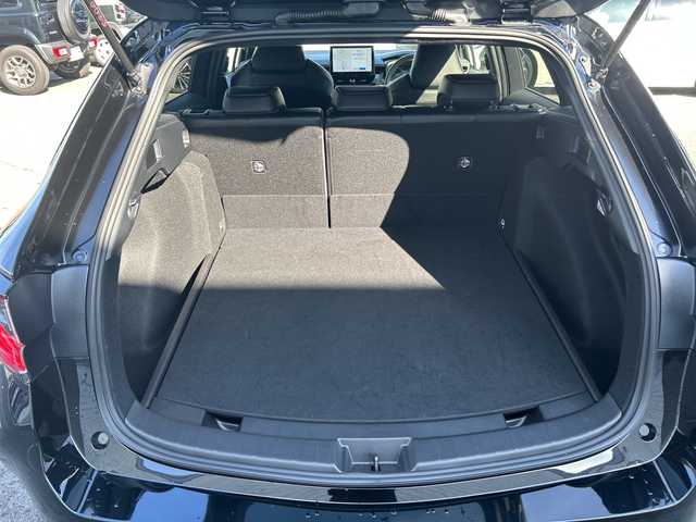 トヨタ カローラツーリング ハイブリッド ダブルバイビー 大阪府 2023(令5)年 1.1万km アティチュードブラックマイカ ワンオーナー/ブラインドスポットモニター/純正10.5型ナビ(BT/USB/フルセグ)/バックカメラ/衝突被害軽減システム/レーンキープアシスト/コーナーセンサー/アダクティブクルーズコントロール/オートライト/オートマチックハイビーム/純正アルミホイール/社外フロアマット/ハーフレザー/ビルトインETC/スマートキー/LEDヘッドライト