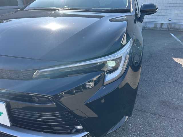 トヨタ カローラツーリング ハイブリッド ダブルバイビー 大阪府 2023(令5)年 1.1万km アティチュードブラックマイカ ワンオーナー/ブラインドスポットモニター/純正10.5型ナビ(BT/USB/フルセグ)/バックカメラ/衝突被害軽減システム/レーンキープアシスト/コーナーセンサー/アダクティブクルーズコントロール/オートライト/オートマチックハイビーム/純正アルミホイール/社外フロアマット/ハーフレザー/ビルトインETC/スマートキー/LEDヘッドライト