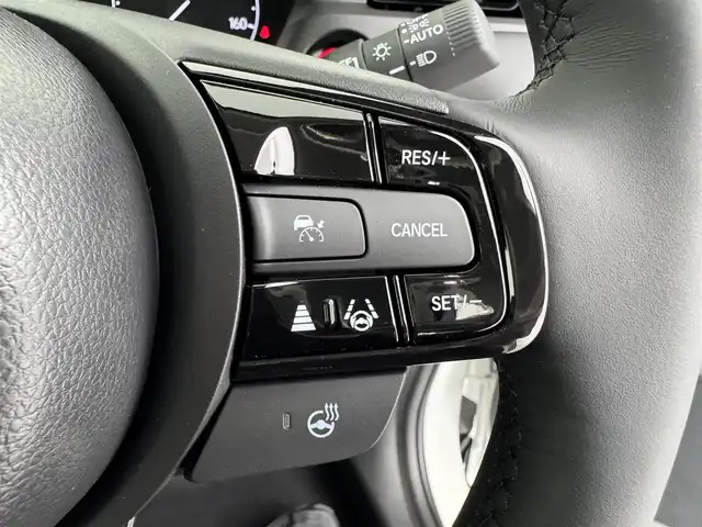ホンダ ヴェゼル ハイブリッド e:HEV Z 愛知県 2025(令7)年 0.1万km未満 プラチナホワイトパール 登録未使用車/ワイヤレス充電/純正9インチナビ/バックカメラ/Bluetooth/フルセグTV/ホンダセンシング/衝突被害軽減システム/クルーズコントロール/レーンキープアシスト/ブラインドスポットモニター/コーナーセンサー/オートマチックハイビーム/オートライト/LEDヘッドライト/LEDフォグランプ/パドルシフト/ステアリングヒーター/シートヒーター/純正AW/ETC2.0/プッシュスタート/スマートキー/スペアキー