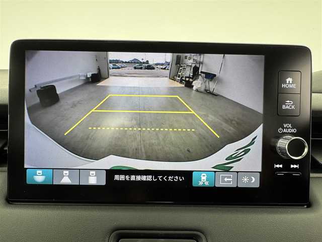 ホンダ ヴェゼル ハイブリッド e:HEV Z 愛知県 2025(令7)年 0.1万km未満 プラチナホワイトパール 登録未使用車/ワイヤレス充電/純正9インチナビ/バックカメラ/Bluetooth/フルセグTV/ホンダセンシング/衝突被害軽減システム/クルーズコントロール/レーンキープアシスト/ブラインドスポットモニター/コーナーセンサー/オートマチックハイビーム/オートライト/LEDヘッドライト/LEDフォグランプ/パドルシフト/ステアリングヒーター/シートヒーター/純正AW/ETC2.0/プッシュスタート/スマートキー/スペアキー