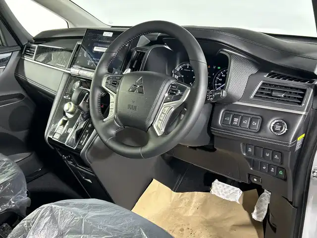三菱 デリカＤ：５ シャモニー 神奈川県 2025(令7)年 0.1万km未満 白Ⅱ 4WD　/e-Assist/オリジナルナビ取付パッケージ＋リアモニター取付パッケージ/社外アルパインD:5専用11型ナビゲーション【EX11NX】/フルセグ　CD DVD　SD　AM FM USB　Bluetooth　AUX　HDMI　Applecarplay　Androidauto/マルチアラウンドモニター【自動防眩ミラー】/衝突被害軽減ブレーキ/車線逸脱警報システム/レーダークルーズコントロールシステム/オートマチックハイビーム/誤発進抑制機能【前進時】/後側方車両検知警報システム【BSW】/後退時車両検知警報システム/ワンタッチ開閉機能付き両側電動スライドドア/パワーバックドア/オートストップ＆ゴー【アイドリングストップ】/スエード合皮コンビシート/運転席パワーシート/前席シートヒーター/革巻きステアリング/ステアリングヒーター/パドルシフト/アルミペダル/リヤヒーター/ECO/プッシュスタート/スマートキー/純正18インチアルミホイール/LEDヘッドランプ/LEDフロントフォグランプ/オートライト/スペアキー