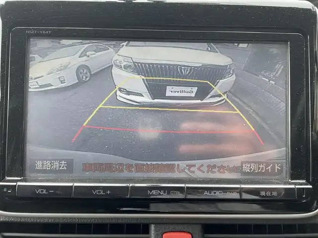トヨタ エスクァイア ハイブリッド Gi 茨城県 2015(平27)年 5.4万km ホワイトパールクリスタルシャイン ワンオーナー/両側オートスライドドア/純正９インチナビ/フルセグテレビ/リアビューモニター/クルーズコントロール/ビルトインETC/クリアランスソナー/オートライト/純正置くだけ充電器/レザーシート/オットマン/シートヒーター/フロアマット純正/ドアバイザー