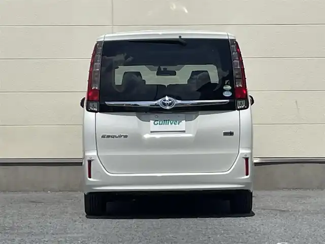トヨタ エスクァイア ハイブリッド Gi 茨城県 2015(平27)年 5.4万km ホワイトパールクリスタルシャイン ワンオーナー/両側オートスライドドア/純正９インチナビ/フルセグテレビ/リアビューモニター/クルーズコントロール/ビルトインETC/クリアランスソナー/オートライト/純正置くだけ充電器/レザーシート/オットマン/シートヒーター/フロアマット純正/ドアバイザー