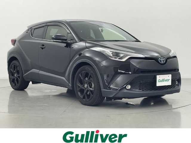 トヨタ Ｃ－ＨＲ G モード ネロ 熊本県 2019(令1)年 8.1万km ブラックマイカ 純正SDナビNSZT-68T/AM/FM/CD/Bluetooth/フルセグテレビ　/バックカメラ　/ビルトインETC/前後クリアランスソナー/前席シートヒーター/トヨタセーフティーセンス/・プリクラッシュセーフティ/・レーンキープアシスト/・アダブティブクルーズコントロール/・ブラインドスポットモニター/横滑り防止/ハーフレザーシート/純正フロアマット/純正１８インチAW/ダブルオートエアコン　/オートライト　/オートマチックハイビーム　/LEDヘッドライト/フォグライト/スマートキー/プッシュスタート/スペアキー1本/取扱説明書
