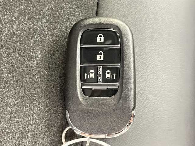 ホンダ Ｎ ＢＯＸ カスタム ターボ 千葉県 2024(令6)年 0.4万km プラチナホワイトパール 純正ナビ/　Bluetooth/フルセグTV/ホンダセンシング/レーダークルーズコントロール/レーンキープアシスト/衝突軽減ブレーキ/クリアランスソナー/先行車発進警報/標識認識機能/電動パーキング/オートホールド/オートハイビーム/両側パワスラ/前席シートヒーター/ハーフレザーシート/パドルシフト/ビルトインETC/前後ドラレコ/シートバックテーブル/ロールサンシェード/フロアマット