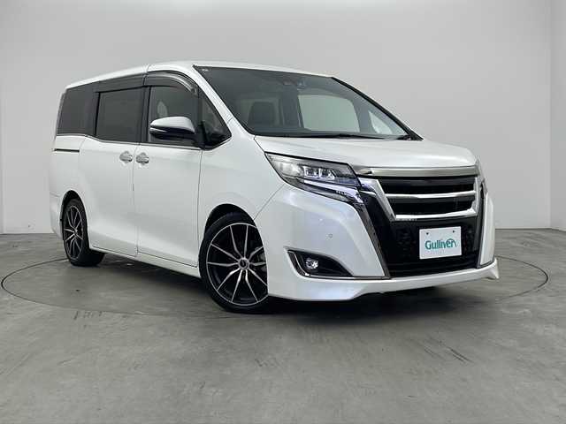 トヨタ エスクァイア Gi プレミアムパッケージ ブラックテーラード 兵庫県 2019(令1)年 4.4万km ホワイトパールクリスタルシャイン ・ALPINEナビ&TV&CD&DVD&SD&BT/・バックカメラ/・両側パワースライドドア/・クルーズコントロール/・純正前後ドライブレコーダー/・ハーフレザーシート/・シートヒーター/・ステアリングヒーター/・トヨタセーフティセンス/・プリクラッシュセーフティ/・クリアナンスソナー/・パーキングサポートブレーキ/・レーンディパーチャーアラート/・オートマチックハイビーム/・ビルトインETC/・nanoe/・純正ウッドコンビステアリング/・社外18インチアルミホイール/・LEDオートライト/・LEDフォグランプ/・社外サスショック/・アイドリングストップ/・純正フロアマット/・スマートキー/・プッシュスタート