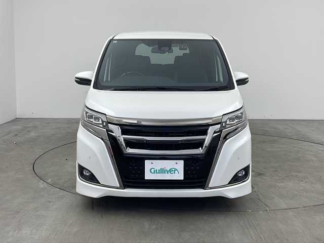 トヨタ エスクァイア Gi プレミアムパッケージ ブラックテーラード 兵庫県 2019(令1)年 4.4万km ホワイトパールクリスタルシャイン ・ALPINEナビ&TV&CD&DVD&SD&BT/・バックカメラ/・両側パワースライドドア/・クルーズコントロール/・純正前後ドライブレコーダー/・ハーフレザーシート/・シートヒーター/・ステアリングヒーター/・トヨタセーフティセンス/・プリクラッシュセーフティ/・クリアナンスソナー/・パーキングサポートブレーキ/・レーンディパーチャーアラート/・オートマチックハイビーム/・ビルトインETC/・nanoe/・純正ウッドコンビステアリング/・社外18インチアルミホイール/・LEDオートライト/・LEDフォグランプ/・社外サスショック/・アイドリングストップ/・純正フロアマット/・スマートキー/・プッシュスタート