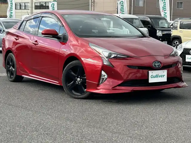 トヨタ プリウス A プレミアム　ツーリングセレ 広島県 2016(平28)年 4万km エモーショナルレッド 純正エアロ(フロント)/純正9インチSDナビ【DSZT-YC4T】/(AM/FM/Bluetooth/CD/DVD/フルセグTV)/バックカメラ/黒本革シート/パワーシート(D席)/シートヒーター(D/N席)/トヨタセーフティセンス/・LDA(レーンディパーチャーアラート)/・ふらつき警報機能/・オートマチックハイビーム/・PCS(プリクラッシュセーフティ)/・レーダークルーズコントロール(全車速追従機能付き)/ITS Connect/HUD(ヘッドアップディスプレイ)/BSM(ブラインドスポットモニター)/S-IPA(シンプルインテリジェントパーキングアシスト)/オートライト/クリアランスソナー/純正17インチアルミホイール/電格ウィンカーミラー/ドアバイザー/フロントフォグランプ/プッシュスタート/ステアリングスイッチ/純正フロアマット/スペアキー×1/保証書/取扱説明書