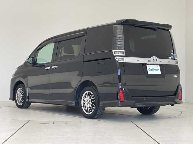 トヨタ ヴォクシー ハイブリッド ZS 煌Ⅲ 愛知県 2021(令3)年 4.7万km ブラック 純正9型ナビ/フリップダウンモニター/両側パワースライドドア/クルーズコントロール/シートヒーター/バックカメラ/コーナーセンサー/純正アルミホイール/LEDヘッドライト/リアオートエアコン/オートマチックハイビーム/ドライブレコーダー/ETC/ステアリングスイッチ/スマートキー/プッシュスタート