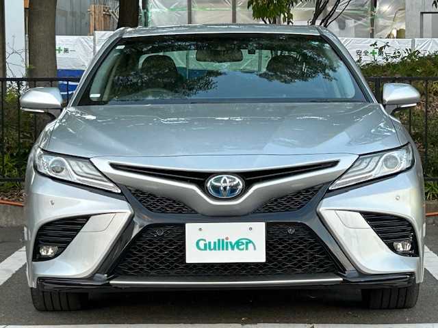 トヨタ カムリ WS ブラックエディション 宮城県 2020(令2)年 8.2万km シルバーM トヨタセーフティセンス/・プリクラッシュセーフティ/・レーダークルーズコントロール/・レーントレーシングアシスト/・レーンディパーチャーアラート/・オートマチックハイビーム/・ロードサインアシスト/・パーキングサポートブレーキ/・ブラインドスポットモニター/・リヤクロストラフィックアラート/純正ナビ/・Bluetooth/CD/DVD/フルセグ/USB/・バックカメラ/・純正ビルドインETC/・ヘッドアップディスプレイ/・ドライブレコーダー前方/アイドリングストップ/コーナーセンサー前後/革巻きステアリング/・ステアリングスイッチ/・パドルシフト/プッシュスタート/・スマートキー/レザーシート/・シートヒーター（運転席＋助手席）/・パワーシート（運転席＋助手席）/オートライト/ドアバイザー/純正フロアマット/純正18インチアルミホイール/純正LEDヘッドライト