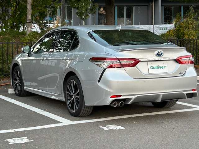 トヨタ カムリ WS ブラックエディション 宮城県 2020(令2)年 8.2万km シルバーM トヨタセーフティセンス/・プリクラッシュセーフティ/・レーダークルーズコントロール/・レーントレーシングアシスト/・レーンディパーチャーアラート/・オートマチックハイビーム/・ロードサインアシスト/・パーキングサポートブレーキ/・ブラインドスポットモニター/・リヤクロストラフィックアラート/純正ナビ/・Bluetooth/CD/DVD/フルセグ/USB/・バックカメラ/・純正ビルドインETC/・ヘッドアップディスプレイ/・ドライブレコーダー前方/アイドリングストップ/コーナーセンサー前後/革巻きステアリング/・ステアリングスイッチ/・パドルシフト/プッシュスタート/・スマートキー/レザーシート/・シートヒーター（運転席＋助手席）/・パワーシート（運転席＋助手席）/オートライト/ドアバイザー/純正フロアマット/純正18インチアルミホイール/純正LEDヘッドライト