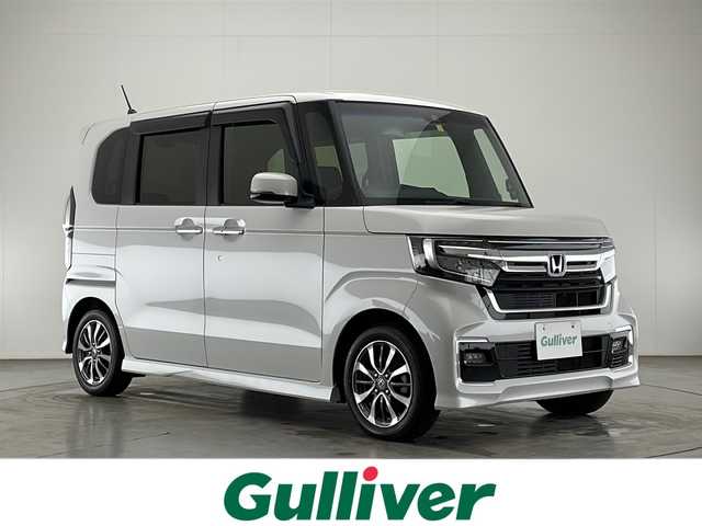 ホンダ Ｎ ＢＯＸ カスタム L 宮崎県 2022(令4)年 4.9万km プラチナホワイトパール 禁煙車/ホンダセンシング/社外ナビTV/（CN-E330D/CD/DVD/Bluetooth/フルセグTV)/社外バックカメラ/純正LEDオートライト/純正LEDフォグ/純正エアロ/純正ルーフエンドスポイラー/純正14インチアルミ/純正フロアマット/左側電動スライドドア/アダプティブクルーズコントロール/レーンディパーチャーアラート/クリアランスソナー/電子パーキング/オートホールド/オートエアコン（プラズマクラスター）/ウインカードアミラー/スマートキー/プッシュエンジンスタート/新車時保証書/取扱い説明書