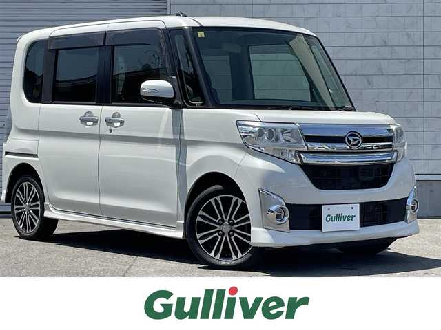 ダイハツ タント カスタム RS SA 道東・釧路十勝 2014(平26)年 8.1万km パールホワイトⅢ 4WD/純正ナビ/(AM FM CD DVD BT フルセグTV)/バックカメラ/両側パワースライドドア/衝突軽減ブレーキ/スマートアシスト/プッシュスタート/スマートキー/ドアバイザー/フロアマット/革巻きステアリング