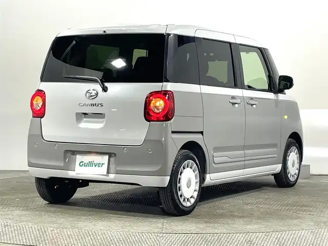 ダイハツ ムーヴ キャンバス ストライプス G 大阪府 2023(令5)年 0.5万km シャイニングホワイトパール/スムーズグレーマイカメタリック 純正ナビTV 360カメラ 両側パワースライドドア シートヒーター 衝突軽減ブレーキ レーンアシスト スマートキー プッシュスタート クリアランスソナー ドリンクヒーター ドライブレコーダー LEDヘッドライト