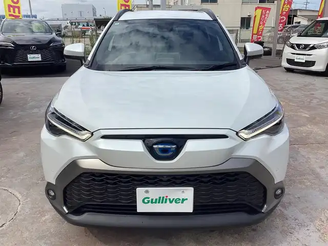 トヨタ カローラ クロス ハイブリッド Z 京都府 2022(令4)年 1万km プラチナホワイトパールマイカ ワンオーナー/パノラミックビューカメラ/ディスプレーオーディオ/　BT USB/PWバックドア/セーフティセンス/　レーダークルーズ/　LTA PCS BSM RCTA PKSB/ビルトインETC/ルーフレール/LEDヘッドライト/LEDフォグライト/運転席PWシート/前席シートヒーター/前後クリアランスソナー/スペアスマートキー/新車保証書/取扱説明書/　