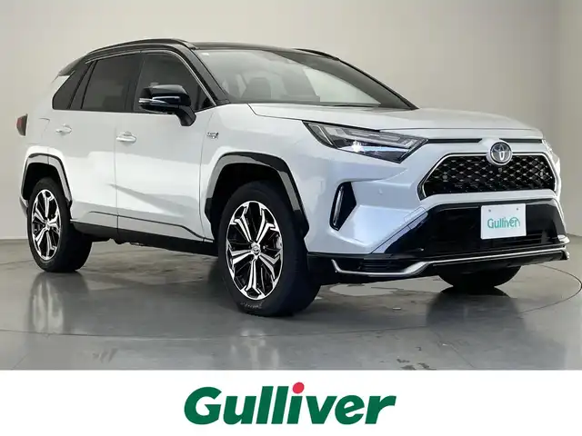 トヨタ ＲＡＶ４ ＰＨＶ Z 愛知県 2023(令5)年 1.6万km アティチュードブラックマイカ/プラチナホワイトパールマイカ 純正１０．５型ＤＡナビ　パノラマムーンルーフ　デジイン　全方位カメラ　ＢＳＭ　充電プラグ　ワイヤレス充電　ベンチレーション　セーフティセンス　衝突軽減　シートヒーター　前後ドラレコ　ＥＴＣ２．０　フルセグＴＶ　サンルーフ　デジタルインナーミラー　パノラミックビューモニター　オートハイビーム　レーンキープ　追従クルコン　純正フロアマット　電動リヤゲート　カーテンエアバッグ　プッシュスタート　スマートキー　ルーフレール　