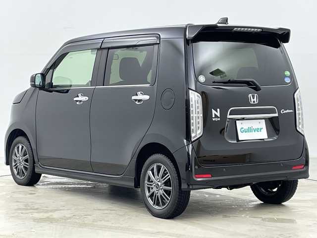 ホンダ Ｎ ＷＧＮ カスタム L ホンダセンシング 道央・札幌 2021(令3)年 2.6万km クリスタルブラックパール ・4WD/・社外ナビ&CD&DVD&SD&BT&TV/・バックカメラ/・ホンダセンシング/・レーダークルーズコントロール/・前席シートヒーター/・ドアミラーヒーター/・ステアリングスイッチ/・ベンチシート/・LEDヘッドライト/・社外14インチAW