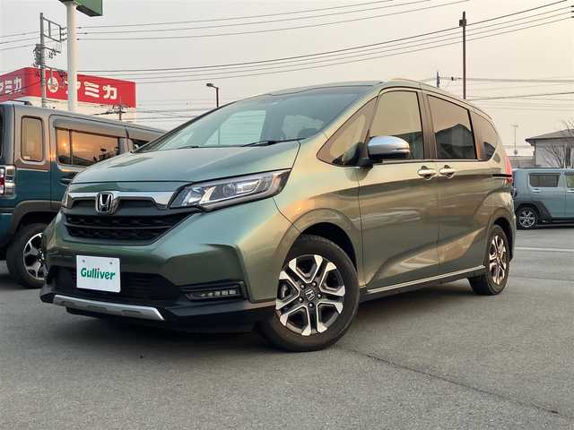 ホンダ フリード クロスター 愛知県 2022(令4)年 1.4万km シルバーミストグリーンM エンジンスタートボタン/スマートキー/アイドリングストップ/オートエアコン/パワーステアリング/パワーウィンドウ/クルーズコントロール/ETC/USB入力端子/バックカメラ/SDナビ（CD.DVD.BT.フルセグ）/ドライブレコーダー/純正フロアマット/純正アルミホイール/両側パワースライドドア/D席N席シートヒーター/D席N席エアシート/ABS/横滑り防止装置/レーンキープアシスト/オートライト/コーナーセンサー/W+サイドエアバック/カーテンエアバック/衝突軽減システム