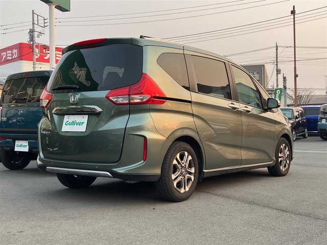 ホンダ フリード クロスター 愛知県 2022(令4)年 1.4万km シルバーミストグリーンM エンジンスタートボタン/スマートキー/アイドリングストップ/オートエアコン/パワーステアリング/パワーウィンドウ/クルーズコントロール/ETC/USB入力端子/バックカメラ/SDナビ（CD.DVD.BT.フルセグ）/ドライブレコーダー/純正フロアマット/純正アルミホイール/両側パワースライドドア/D席N席シートヒーター/D席N席エアシート/ABS/横滑り防止装置/レーンキープアシスト/オートライト/コーナーセンサー/W+サイドエアバック/カーテンエアバック/衝突軽減システム