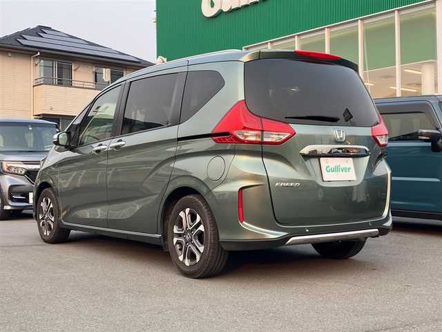 ホンダ フリード クロスター 愛知県 2022(令4)年 1.4万km シルバーミストグリーンM エンジンスタートボタン/スマートキー/アイドリングストップ/オートエアコン/パワーステアリング/パワーウィンドウ/クルーズコントロール/ETC/USB入力端子/バックカメラ/SDナビ（CD.DVD.BT.フルセグ）/ドライブレコーダー/純正フロアマット/純正アルミホイール/両側パワースライドドア/D席N席シートヒーター/D席N席エアシート/ABS/横滑り防止装置/レーンキープアシスト/オートライト/コーナーセンサー/W+サイドエアバック/カーテンエアバック/衝突軽減システム