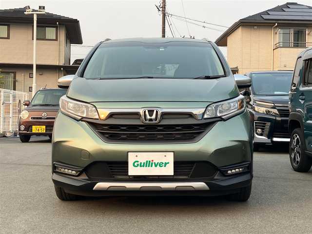 ホンダ フリード クロスター 愛知県 2022(令4)年 1.4万km シルバーミストグリーンM エンジンスタートボタン/スマートキー/アイドリングストップ/オートエアコン/パワーステアリング/パワーウィンドウ/クルーズコントロール/ETC/USB入力端子/バックカメラ/SDナビ（CD.DVD.BT.フルセグ）/ドライブレコーダー/純正フロアマット/純正アルミホイール/両側パワースライドドア/D席N席シートヒーター/D席N席エアシート/ABS/横滑り防止装置/レーンキープアシスト/オートライト/コーナーセンサー/W+サイドエアバック/カーテンエアバック/衝突軽減システム