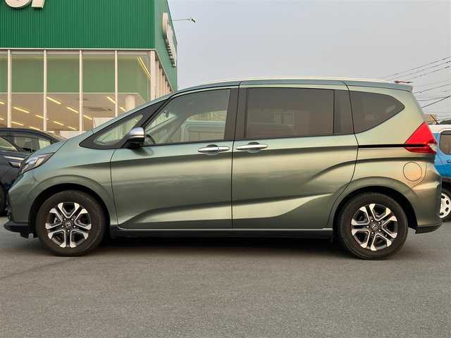 ホンダ フリード クロスター 愛知県 2022(令4)年 1.4万km シルバーミストグリーンM エンジンスタートボタン/スマートキー/アイドリングストップ/オートエアコン/パワーステアリング/パワーウィンドウ/クルーズコントロール/ETC/USB入力端子/バックカメラ/SDナビ（CD.DVD.BT.フルセグ）/ドライブレコーダー/純正フロアマット/純正アルミホイール/両側パワースライドドア/D席N席シートヒーター/D席N席エアシート/ABS/横滑り防止装置/レーンキープアシスト/オートライト/コーナーセンサー/W+サイドエアバック/カーテンエアバック/衝突軽減システム