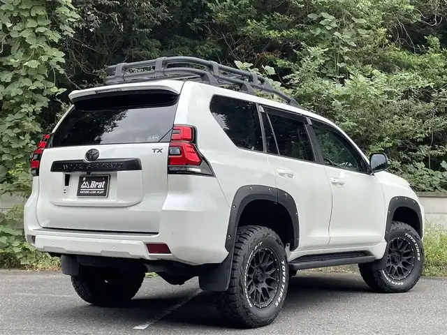トヨタ ランドクルーザー プラド TX 千葉県 2020(令2)年 3.2万km ホワイトパールクリスタルシャイン AIS検査済み/4WD/Brat オリジナルリフトアップコイル/JAOSフェンダーガーニッシュ/WEDS　マッドヴァンス17インチアルミ（社外）/TOYOオープンカントリーR/Tタイヤ（社外）/ルーフラック/純正ナビ　/バックカメラ/ETC/前後ドラレコ/Bluetooth/フルセグTV/ドアバイザー/プッシュスタート/スマートキー/スペアキー/クルーズコントロール/衝突被害軽減/クリアランスソナー/横滑り防止機能/オートマチックハイビーム/ヘッドライトウォッシャー/取説/保証書
