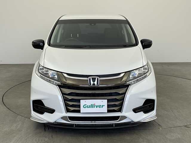 ホンダ オデッセイ アブソルート ホンダセンシング 兵庫県 2018(平30)年 5万km プラチナホワイトパール ・社外アンダーエアロ/・ENKEi 19インチAW/・純正9インチナビ＆BT＆TV＆CD＆DVD＆SD/・両側パワースライドドア/・衝突軽減ブレーキ/・車線逸脱警報/・レーダークルーズコントロール/・パーキングセンサー/・LEDヘッドライト/・ビルトインETC2.0/・バックカメラ/・スマートキー/・ハーフレザーシート/・社外テールランプ/・アイドリングストップ/・純正フロアマット/・ダブルエアコン/・スペアキー