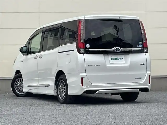 トヨタ エスクァイア ハイブリッド Gi ブラックテーラード 茨城県 2016(平28)年 4.2万km ホワイトパールクリスタルシャイン プッシュスタート/スマートキー/スペアキー/保証書付き/取扱説明書/モデリスタエアロ（前横後）/Bluetooth接続/フルセグTV/クルーズコントロール/両側パワースライド/オートマチックハイビーム/オートライト/バックカメラ/前席シートヒーター/衝突被害軽減システム/ブラックレザーシート