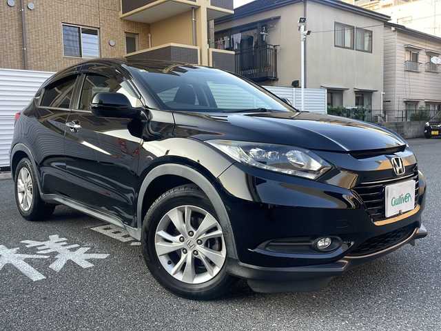 ホンダ ヴェゼル X ホンダセンシング 広島県 2016(平28)年 13.2万km クリスタルブラックパール /登録時走行距離/　　　　　　　131999キロ/ワンオーナー/アイドリングストップ/純正ナビ/バックカメラ/ワンセグ/クルーズコントロール/スペアキー×１/ビルトインETC/新車時整備手帳/　　【保証書】/取扱説明書/