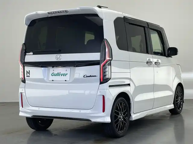 ホンダ Ｎ ＢＯＸ カスタム L ターボ スタイル+ブラック 愛知県 2023(令5)年 3.1万km プラチナホワイトパール 純正９型ナビ　シートヒーター　禁煙車　フルセグＴＶ　カープレイ　バックカメラ　ハーフレザー　両側パワスラ　前後ドラレコ　ホンダセンシング　衝突軽減　追従クルコン　パドルシフト　コーナーセンサー　ＬＥＤオートライト　フォグランプ　ETC　電動パーキング　リアロールシェード