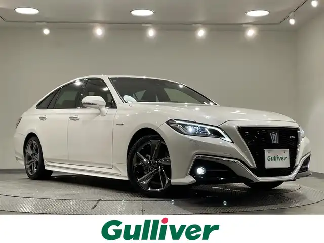 トヨタ クラウン ハイブリッド RS 愛知県 2018(平30)年 7.5万km ホワイトパールクリスタルシャイン 純正８インチナビ/プリクラッシュセーフティ/レーダークルーズコントロール/クリアランスソナー/レーンキープアシスト/先行車発進告知/電動パーキングブレーキ/ブレーキホールド/パドルシフト/ハンドルヒーター/シートーヒーター/ＡＣ１００Ｖコンセント/ドライブレコーダー/ビルトインＥＴＣ/バックカメラ/アクセサリーソケット/ISOFIX/LEDヘッドライト/オートハイビーム/純正フロアマット/純正18インチアルミホイール