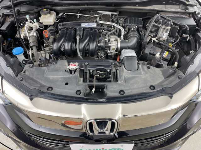 ホンダ ヴェゼル ハイブリッド X ホンダセンシング 道央・札幌 2018(平30)年 7.8万km ルーセブラックM ・ワンオーナー/・純正ナビ＆ＴＶ＆ＢＴ＆ＤＶＤ＆ＣＤ＆ＵＳＢ/・バックカメラ/・ホンダセンシング/・レーンキープアシスト/・横滑り防止/・パドルシフト/・アダプティブクルーズコントロール/・フロントワイパーデアイサー/・ドアミラーヒーター/・前席シートヒーター/・オートライト/・ＬＥＤヘッドライト/・電動パーキングブレーキ/・ブレーキホールド/・純正リモコンスターター/・保証書有り