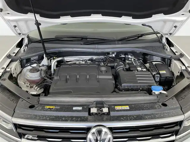 フォルクスワーゲン ティグアン TDI 4モーション Rライン ブラックスタイル 大分県 2020(令2)年 8.5万km オリックスホワイトパールエフェクト ワンオーナー/アラウンドビューカメラ/ACC（全車速追従機能付）/FrontAssist/LaneAssist/TrafficAssist/SideAssistPlus/ParkAssist/ダイナミックコーナリングライト/ダイナミックライトアシスト/パークディスタンスコントロール/オプティカルパーキングシステム/リヤトラフィックアラート/ヘッドアップディスプレイ/オートホールド機能/パワーテールゲート/9.2型SSDナビゲーション/・フルセグTV、DVD再生可、BT対応/ステアリングスイッチ/パドルシフト/前席シートヒーター/ビルトインETC2.0/純正フロアマット/オートライト/LEDヘッドライト/純正19インチアルミホイール/保証書、取説、スペアキー有り