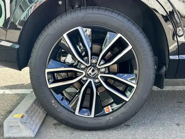 ホンダ ヴェゼル ハイブリッド e:HEV Z 和歌山県 2025(令7)年 0.1千km クリスタルブラックパール 登録済み未使用車/Honda CONNECTディスプレー（ナビ付）/フルセグTV/バックカメラ/（BT/AppleCarPlay/AndroidAuto）/衝突軽減ブレーキ/アダプティブクルーズコントロール/路外逸脱抑制機能/ブラインドスポットインフォメーション/パーキングセンサー/踏み間違い衝突軽減/電子パーキング/オートホールド/ハーフレザーシート/シートヒーター/ステアリングヒーター/パワーバックドア/純正ビルトインETC２．０/純正１８インチアルミホイール/LEDヘッドライト/LEDフォグランプ/オートライト/アダプティブドライビングビーム