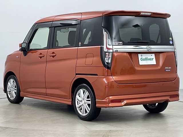 スズキ ソリオ HV MZ 道央・札幌 2021(令3)年 3.6万km フレイムオレンジPM ・4WD/・ワンオーナー/・純正ナビフルセグTV&CD&BT&USB/・全方位カメラ/・両側パワースライドドア/・HUD/・スズキセーフティサポート/・衝突軽減ブレーキ/・誤発進抑制機能/・車線逸脱抑制機能/・リヤクロストラフィックアラート/・前席シートヒーター/・アダプティブクルーズコントロール/・後方コーナーセンサー/・ステアリングスイッチ/・純正エンジンスターター/・純正フロアマット/・社外15インチAW付スタッドレス積込/・オートライト/・LEDヘッドライト/・LEDフォグ/・アイドリングストップ/・プッシュスタート/・ETC/・スマートキー