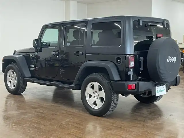 クライスラー・ジープ ジープ ラングラー アンリミテッド スポーツ 道央・札幌 2018(平30)年 7.6万km ブラック 4WD/社外メモリナビ/・フルセグTV/CD/DVD/BT/SD/バック、サイドカメラ/ETC/社外前後ドライブレコーダー/横滑り防止装置/ダウンヒルアシストコントロール/クルーズコントロール/オートライト/LEDヘッドライト/フォグライト/ヘッドライトレベライザー/純正フロアマット/サイドステップ/純正18インチAW/リモコンキー/スペアキー/背面タイヤ/社外AW付き冬タイヤ積込/・265/70R17 ’17製 6mm/新車時保証書/取扱説明書