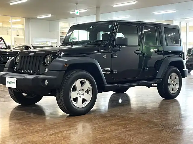 クライスラー・ジープ ジープ ラングラー アンリミテッド スポーツ 道央・札幌 2018(平30)年 7.6万km ブラック 4WD/社外メモリナビ/・フルセグTV/CD/DVD/BT/SD/バック、サイドカメラ/ETC/社外前後ドライブレコーダー/横滑り防止装置/ダウンヒルアシストコントロール/クルーズコントロール/オートライト/LEDヘッドライト/フォグライト/ヘッドライトレベライザー/純正フロアマット/サイドステップ/純正18インチAW/リモコンキー/スペアキー/背面タイヤ/社外AW付き冬タイヤ積込/・265/70R17 ’17製 6mm/新車時保証書/取扱説明書