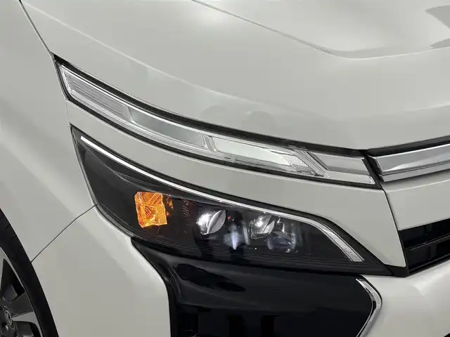 トヨタ ヴォクシー ZS 煌Ⅲ 福井県 2021(令3)年 3.1万km ホワイトパールクリスタルシャイン 純正ナビ/CD/DVD/Bluetooth/TV/トヨタセーフティーセンス/・プリクラッシュセーフティ/・レーンディパーチャーアラート/・オートマチックハイビーム/両側パワースライドドア/クルーズコントロール/バックカメラ/横滑り防止装置/レーンキープアシスト/LED/オートライト