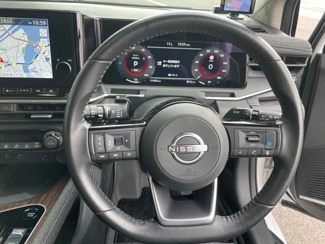 日産 オーラ G 愛知県 2023(令5)年 3.2万km ピュアホワイトパール / スーパーブラック 2トーン プロパイロット/純正9型ディスプレイオーディオナビ/全方位カメラ/クルーズコントロール/プレミアムサウンドBOSE/バックカメラ/コーナーセンサー/純正アルミホイール/ETC2.0/ブラインドスポットモニター/インテリジェントミラー/オートマチックハイビーム/ワイヤレス充電機/衝突軽減システム/フルセグ/Bluetooth/ステアリングスイッチ/スマートキー/プッシュスタート