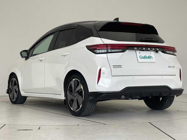 日産 オーラ G 愛知県 2023(令5)年 3.2万km ピュアホワイトパール / スーパーブラック 2トーン プロパイロット/純正9型ディスプレイオーディオナビ/全方位カメラ/クルーズコントロール/プレミアムサウンドBOSE/バックカメラ/コーナーセンサー/純正アルミホイール/ETC2.0/ブラインドスポットモニター/インテリジェントミラー/オートマチックハイビーム/ワイヤレス充電機/衝突軽減システム/フルセグ/Bluetooth/ステアリングスイッチ/スマートキー/プッシュスタート