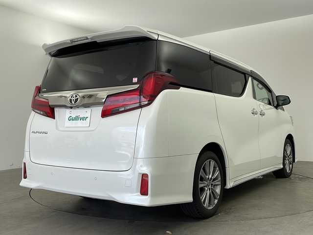 トヨタ アルファード S タイプゴールドⅡ 兵庫県 2021(令3)年 2.1万km ホワイトパールクリスタルシャイン ・純正9インチナビ＆Bluetooth＆＆CD/DVD再＆MiraCast＆TV/・バックカメラ/・純正ビルドインETC2.0/・トヨタセーフティセンス/・プリクラッシュセーフティ/・レーダークルーズコントロール/・レーンディパーチャーアラート/・クリアランスソナー/・ロードサインアシスト（RSA）/・パーキングサポートブレーキ/・naneoエアコン/・前後コーナーセンサー/・両側パワースライドドア/・ハーフレザーシート/・オートマチックハイビーム/・3眼LEDヘッドライト/・LEDフォグランプ/・シーケンシャルウィンカー/・電動パーキング/・パワーバックドア/・前後ドライブレコーダー/・オットマンシート/・純正18インチアルミホイール/・純正フロアマット/・ステアリングリモコン/・W＋サイドエアバック/・カーテンエアバック/・エンジンスタートボタン/・スマートキー/・MTモード付AT/・WACエアコン/・ハーフレザーシート/・ウインドシールドガラス（UVカット機能付き）/・フロントドアグリーンガラス（UVカット機能付き）