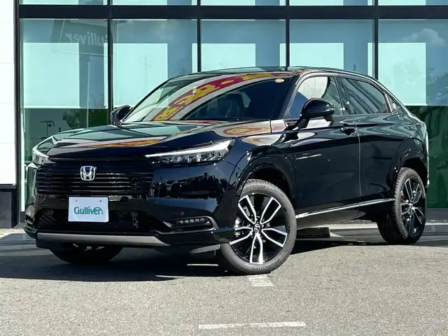ホンダ ヴェゼル ハイブリッド e:HEV Z 和歌山県 2025(令7)年 0.1千km クリスタルブラックパール 登録済み未使用車/Honda CONNECTディスプレー（ナビ付）/フルセグTV/バックカメラ/（BT/AppleCarPlay/AndroidAuto）/衝突軽減ブレーキ/アダプティブクルーズコントロール/路外逸脱抑制機能/ブラインドスポットインフォメーション/パーキングセンサー/踏み間違い衝突軽減/電子パーキング/オートホールド/ハーフレザーシート/シートヒーター/ステアリングヒーター/パワーバックドア/純正ビルトインETC２．０/純正１８インチアルミホイール/LEDヘッドライト/LEDフォグランプ/オートライト/アダプティブドライビングビーム