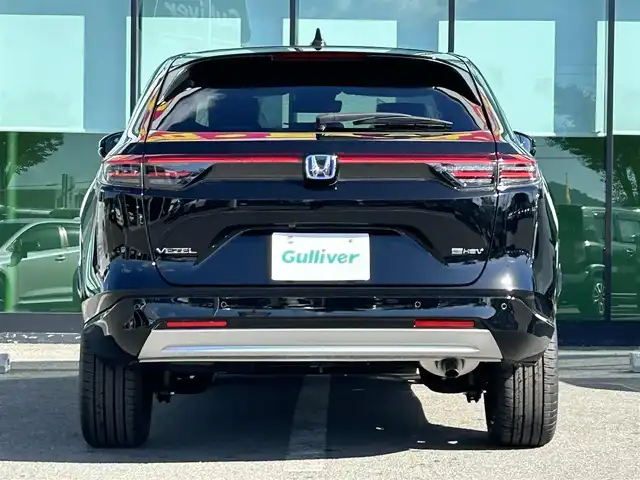 ホンダ ヴェゼル ハイブリッド e:HEV Z 和歌山県 2025(令7)年 0.1千km クリスタルブラックパール 登録済み未使用車/Honda CONNECTディスプレー（ナビ付）/フルセグTV/バックカメラ/（BT/AppleCarPlay/AndroidAuto）/衝突軽減ブレーキ/アダプティブクルーズコントロール/路外逸脱抑制機能/ブラインドスポットインフォメーション/パーキングセンサー/踏み間違い衝突軽減/電子パーキング/オートホールド/ハーフレザーシート/シートヒーター/ステアリングヒーター/パワーバックドア/純正ビルトインETC２．０/純正１８インチアルミホイール/LEDヘッドライト/LEDフォグランプ/オートライト/アダプティブドライビングビーム