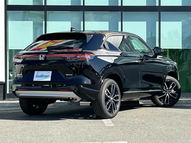 ホンダ ヴェゼル ハイブリッド e:HEV Z 和歌山県 2025(令7)年 0.1千km クリスタルブラックパール 登録済み未使用車/Honda CONNECTディスプレー（ナビ付）/フルセグTV/バックカメラ/（BT/AppleCarPlay/AndroidAuto）/衝突軽減ブレーキ/アダプティブクルーズコントロール/路外逸脱抑制機能/ブラインドスポットインフォメーション/パーキングセンサー/踏み間違い衝突軽減/電子パーキング/オートホールド/ハーフレザーシート/シートヒーター/ステアリングヒーター/パワーバックドア/純正ビルトインETC２．０/純正１８インチアルミホイール/LEDヘッドライト/LEDフォグランプ/オートライト/アダプティブドライビングビーム