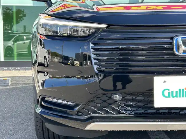 ホンダ ヴェゼル ハイブリッド e:HEV Z 和歌山県 2025(令7)年 0.1千km クリスタルブラックパール 登録済み未使用車/Honda CONNECTディスプレー（ナビ付）/フルセグTV/バックカメラ/（BT/AppleCarPlay/AndroidAuto）/衝突軽減ブレーキ/アダプティブクルーズコントロール/路外逸脱抑制機能/ブラインドスポットインフォメーション/パーキングセンサー/踏み間違い衝突軽減/電子パーキング/オートホールド/ハーフレザーシート/シートヒーター/ステアリングヒーター/パワーバックドア/純正ビルトインETC２．０/純正１８インチアルミホイール/LEDヘッドライト/LEDフォグランプ/オートライト/アダプティブドライビングビーム